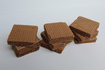Chocolate square wafers, isolated on white background
