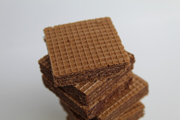 Chocolate square wafers, isolated on white background