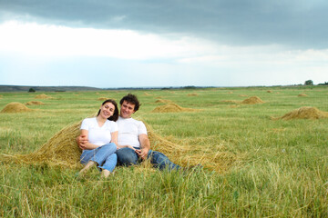 Fototapeta na wymiar Portrait of a young couple in love outdoors