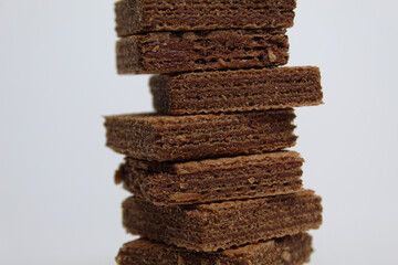 Chocolate square wafers, isolated on white background