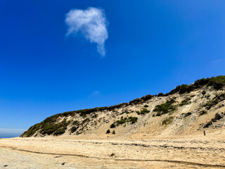 Fototapeta na wymiar Drought-Ridden Mountain Under Clear Blue Sky