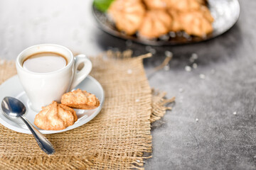 Homemade coconut cookies on a gray background. Healthy food concept. For advertising confectionery products