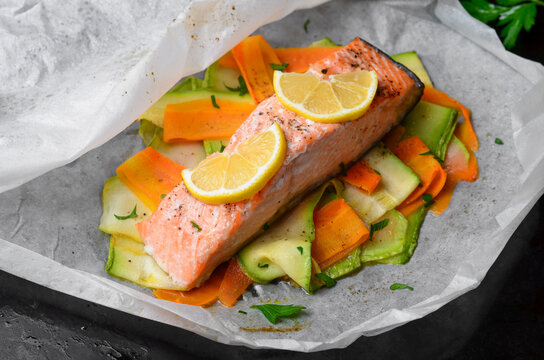 Salmon Baked In Parchment Paper With Zucchini And Carrot
