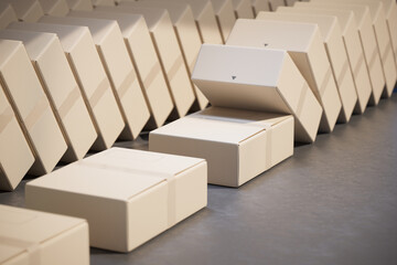 Pristine White Geometric Cardboard Boxes Aligned on a Solid Gray Background