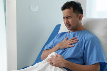 A male patient who had chest pain due to heavy work, shock, and insufficient rest was treated by a doctor at the hospital.