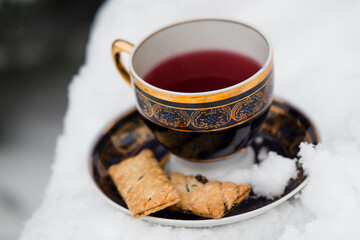 a cup of tea in the snow