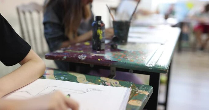 Children studio teaching drawing and painting. Creative workshop concept