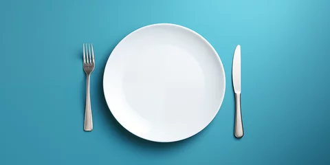 Poster empty white plate with cutlery.  isolation on a blue background © сергей костюченко