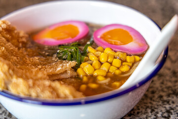 Japanese Sapporo ramen with pork bone broth.standard ramen seasoned with soy sauce.