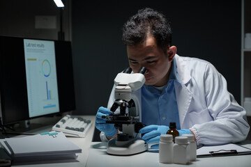 Biochemical research scientists are conducting research in a medical laboratory working with...