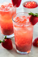 Sweet and refreshing strawberry lemonade with boba popping pearls.