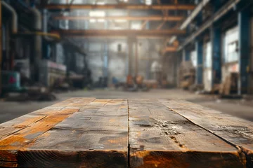 Foto op Canvas Foreground Empty Table, Blurry Abandoned Factory Background © ITrWorks