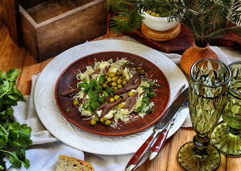 Salad with heart, cheese, peas and cilantro