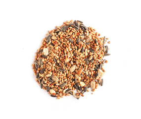 Bird food on a white studio background, view from above
