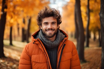 Portrait of happy man with autumn outdoors