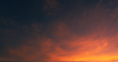 Dusk sky on twilight after sundown with horizon orange, red sunlight sunset clouds in golden hour...