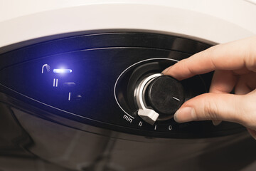 Obraz premium Electrical boiler control panel for hot water heating. Close up view.