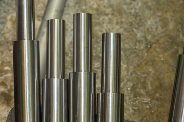 The metal shaft parts from lathe machine finish cut.