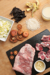 ingredients for spanish autumn rice with mushrooms and pork jowl meat