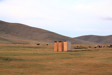 Wooden outdoor toilet in nature. Rest in Kyrgyzstan, song kol lake