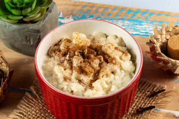 cup of canjica, typical food consumed in the Brazilian Festa Juninas