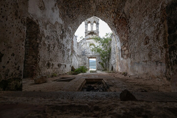 Profaned Empty Tombs Indoors Ruins of ancient Monastery of Saint Marry of the Angels - Osor , Cres Island Croatia - obrazy, fototapety, plakaty