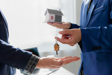 Cover image of a real estate agent auctioning off houses in the project to explain the details to clients. Explain and present information about buying a home and mortgages. Real estate trading concep