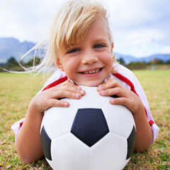 Girl, player and soccer ball with portrait, happy and ready for game, field and child. Outdoor,...