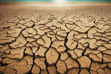 Dry land with cracked earth under blue sky background. - obrazy, fototapety, plakaty