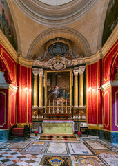 view of an ornate side altar in the Metropolitan Cathedral of St. Paul in Mdina
