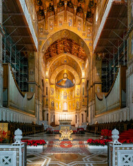 view of the central nave and altar of the Monreale Cathedral in Sicily