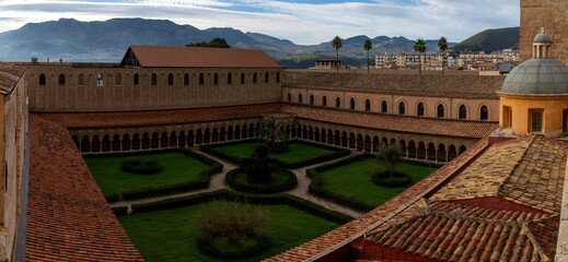 panorama view of the cloister and inner courtyard of the Monreale Cathedral in Sicily