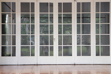 big white french doors. Interior Columns in Corridor - Backdrop Photo Featuring Architectural Columns, Aesthetic Elements Enhancing the Corridor's Design, Stylish Interior Composition