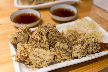Deep fry stinky tofu on the dish