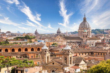 Fototapeta na wymiar Rome, Italy. Urban landscape, blue sky with clouds, church exterior architecture