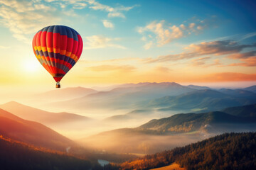 Hot Air Balloon Flight at Sunrise Over Mountains
