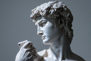 Michelangelo's David statue holding a smartphone. Ancient Greek sculpture, statue of hero chatting, scrolling social media. Doomscrolling, mental health concept. Bad habits, Consuming information