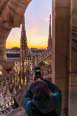 Fototapeta premium Beautiful sunset over the Duomo Cathedral in Milan Italy on december 2024