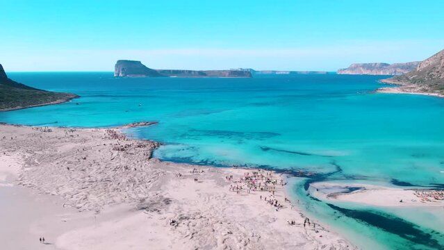 Aerial overview of Balos Beach in Crete with tourists on holiday in Greece