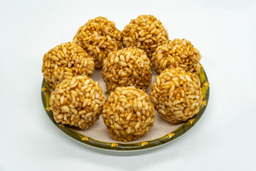 A plate of Murmura Murai Ladoo Puffed Rice in Jaggery Balls for Maghe Makar Sankranti Festival