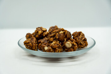 A Plate of Peanut Ladoo for Makar Sankranti which is Peantus dipped in Sweet Jaggery gud in Nepal and India