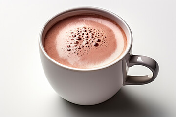 Hot chocolate cocoa drink in white ceramic cup isolated on white background. Top view.