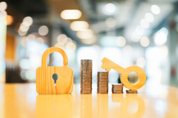 The symbol of the lock and pile of money represents the stability of the currency and interest on...