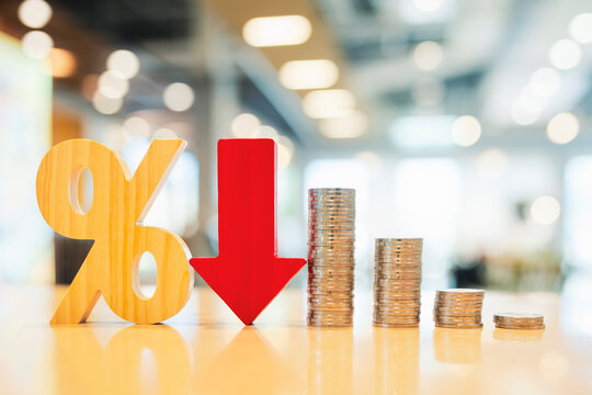 Percentage model, coin stack and down arrow, concepts for success, methods, systems of raising or lowering Fed interest rates to correct inflation concepts.