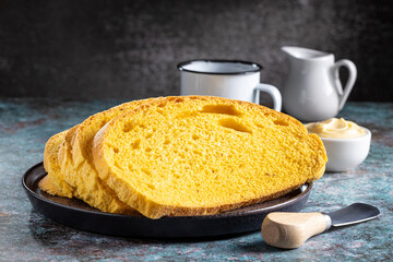 Corn bread. Delicious cornbread with butter and coffee.