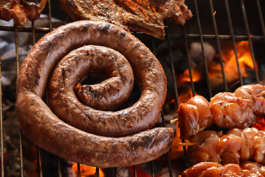 South African braai with boerewors and kebabs. sausages on the grill. Barbecue