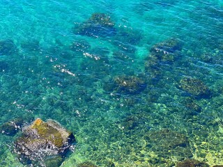 Sea clear transparent water blue turquoise surface.