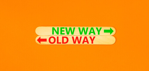 New or old way symbol. Concept word New way Old way on beautiful wooden stick. Beautiful orange...