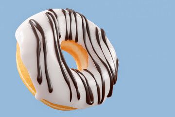 Chocolate glazed donut with sprinkles on a grey background