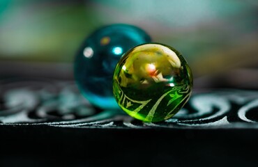 glass marbles on a velvet mat